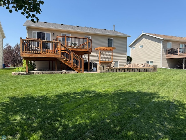 1623 10th St W, West Fargo, ND 58078 - rear view of property featuring a wooden deck, stairs, and a yard