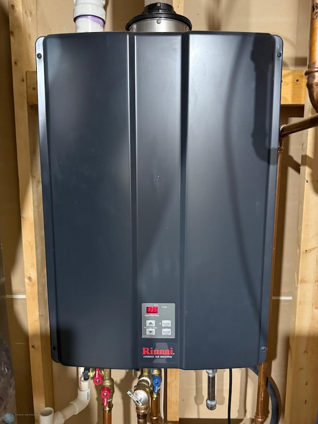 1623 10th St W, West Fargo, ND 58078 - utility room with water heater