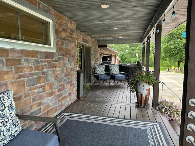 28040 Csah 25, Swede Grove Twp, MN 56243 - wooden porch featuring grilling area