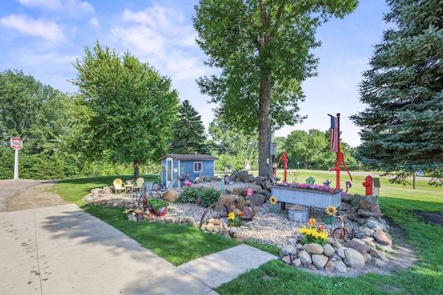 28040 Csah 25, Swede Grove Twp, MN 56243 - view of patio / terrace with a storage shed
