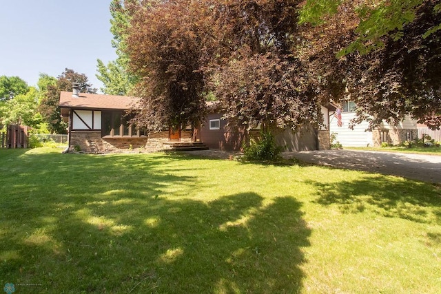 2321 17th Ave S, Fargo, ND 58103 - view of grassy yard with driveway