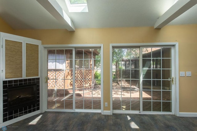2321 17th Ave S, Fargo, ND 58103 - doorway with wood finished floors and a skylight