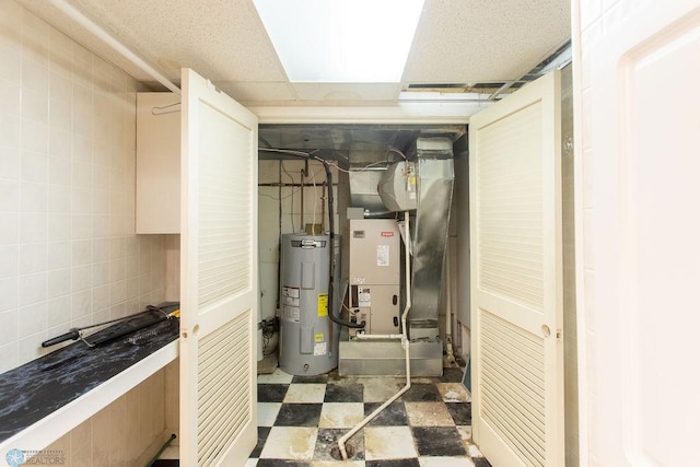 2321 17th Ave S, Fargo, ND 58103 - utility room featuring water heater and heating unit