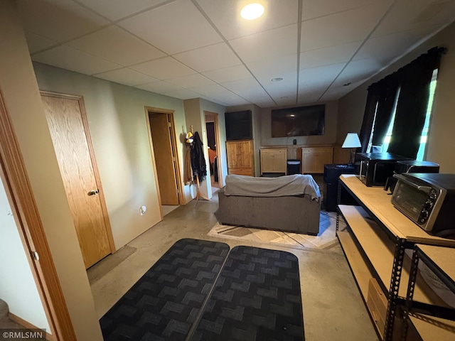 500 Albion Pl, Maple Lake, MN 55358 - living area featuring a drop ceiling and concrete flooring