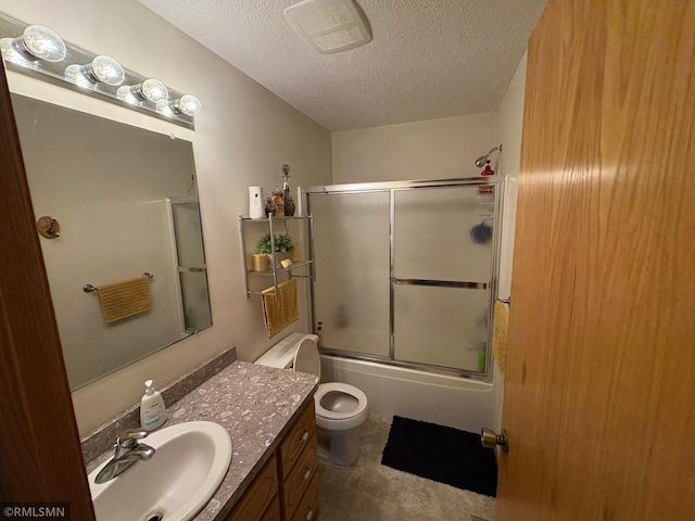 500 Albion Pl, Maple Lake, MN 55358 - bathroom with a textured ceiling, vanity, and shower / bath combination with glass door