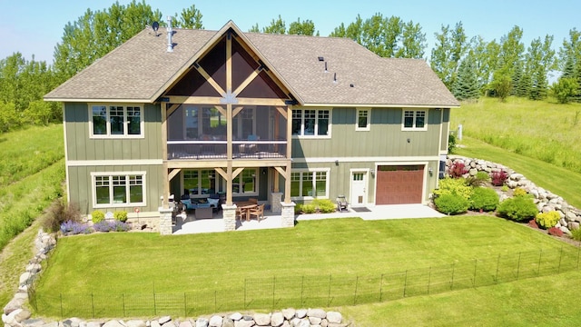 26888 734th Ave, Dassel Twp, MN 55325 - back of property with a patio area, a yard, an outdoor hangout area, and a shingled roof
