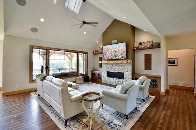 26888 734th Ave, Dassel Twp, MN 55325 - living room with high vaulted ceiling, a fireplace, a ceiling fan, wood finished floors, and recessed lighting