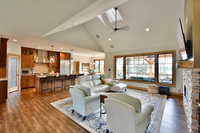 26888 734th Ave, Dassel Twp, MN 55325 - living room featuring high vaulted ceiling, a ceiling fan, recessed lighting, and wood finished floors