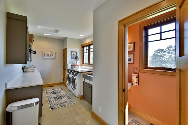 26888 734th Ave, Dassel Twp, MN 55325 - laundry area with washing machine and clothes dryer, cabinet space, light tile patterned floors, and recessed lighting