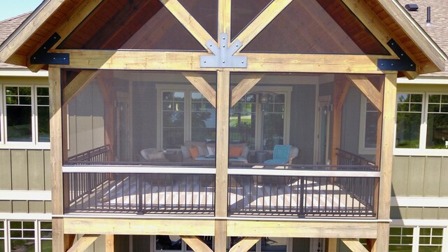 26888 734th Ave, Dassel Twp, MN 55325 - wooden deck featuring a sunroom