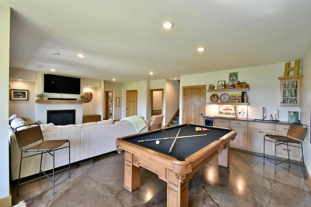 26888 734th Ave, Dassel Twp, MN 55325 - recreation room with concrete floors, a dry bar, a fireplace, billiards table, and recessed lighting