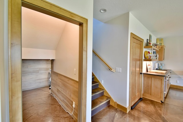 26888 734th Ave, Dassel Twp, MN 55325 - stairway featuring finished concrete floors