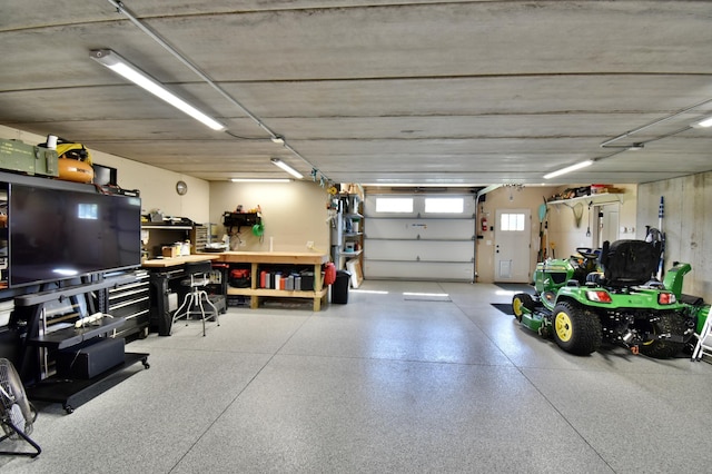 26888 734th Ave, Dassel Twp, MN 55325 - garage featuring a workshop area