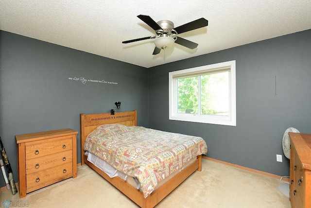 2441 60th Ave S, Fargo, ND 58104 - bedroom with light colored carpet and ceiling fan