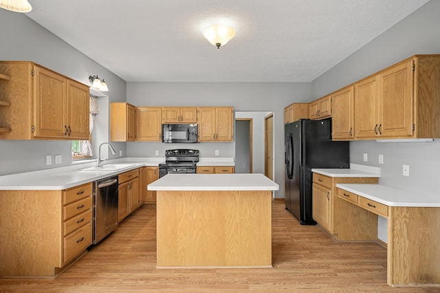 8798 Fountain Ln N, Maple Grove, MN 55311 - kitchen featuring black appliances, a kitchen island, light wood finished floors, and light countertops