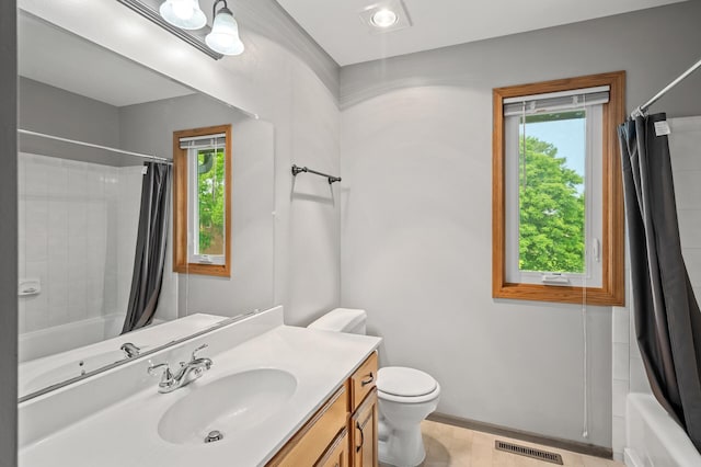 8798 Fountain Ln N, Maple Grove, MN 55311 - full bath with shower / bath combo, plenty of natural light, and vanity