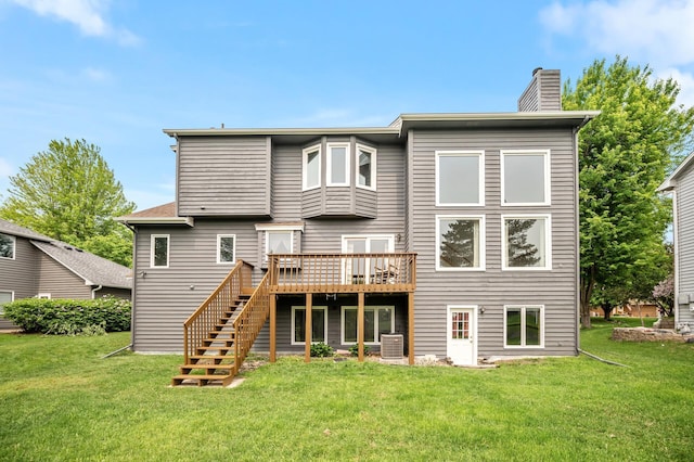 8798 Fountain Ln N, Maple Grove, MN 55311 - rear view of property with a deck, stairs, a chimney, and a lawn