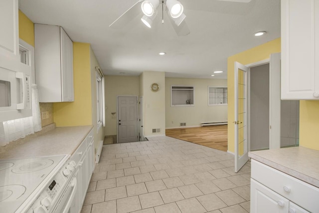 4901 99th St, Bloomington, MN 55437 - kitchen with white appliances, ceiling fan, white cabinetry, recessed lighting, and light countertops