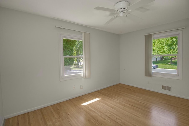 4901 99th St, Bloomington, MN 55437 - unfurnished room with light wood-style flooring and a ceiling fan