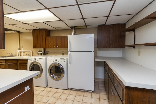 4901 99th St, Bloomington, MN 55437 - laundry room featuring independent washer and dryer and light tile patterned floors