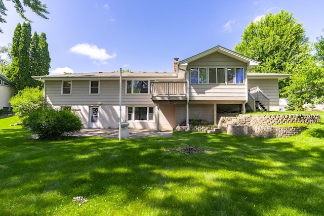 4901 99th St, Bloomington, MN 55437 - rear view of property with a chimney, a yard, a wooden deck, and stairs