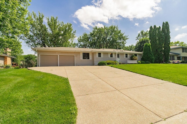 4901 99th St, Bloomington, MN 55437 - view of front of property featuring driveway, a garage, and a front yard