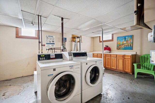 1812 Clinton Ave Unit 203, Minneapolis, MN 55404 - laundry room with separate washer and dryer and cabinet space
