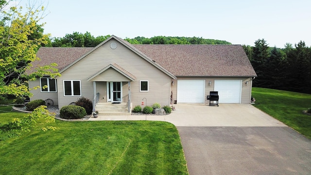 16521 Silver Ln NW, Evansville, MN 56326 - view of front of home featuring driveway, a shingled roof, a garage, and a front yard