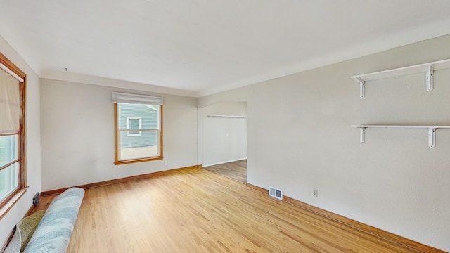 1126 Breen St, Saint Paul, MN 55106 - empty room with light wood finished floors and baseboards