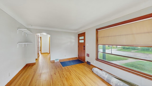 1126 Breen St, Saint Paul, MN 55106 - foyer featuring light wood-type flooring and baseboards