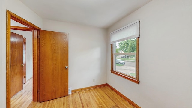 1126 Breen St, Saint Paul, MN 55106 - empty room with light wood-type flooring and baseboards