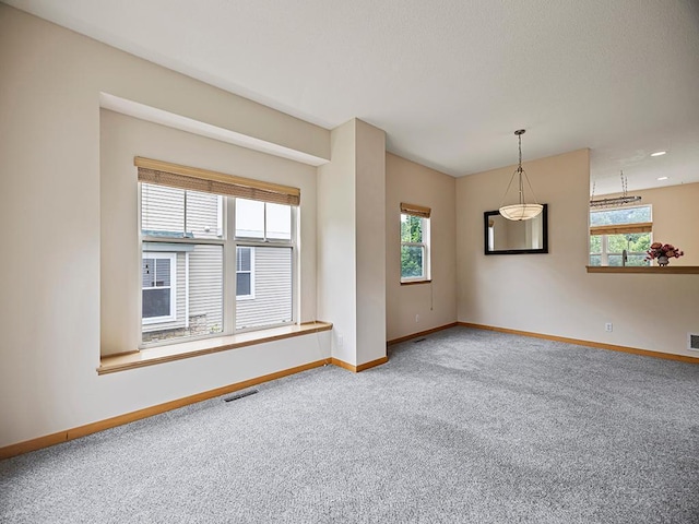 906 New Century Blvd S, Maplewood, MN 55119 - carpeted spare room featuring baseboards