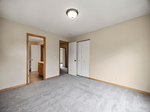 906 New Century Blvd S, Maplewood, MN 55119 - unfurnished bedroom with carpet floors, a closet, and ensuite bath