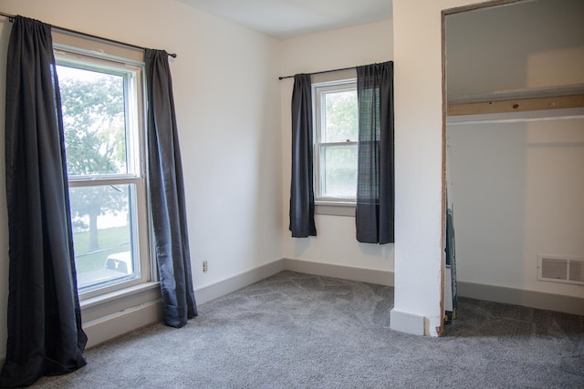 305 2nd Ave SE, Plainview, MN 55964 - unfurnished bedroom with carpet and baseboards