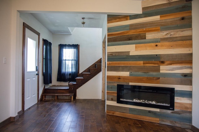 305 2nd Ave SE, Plainview, MN 55964 - foyer entrance with stairway, wood-type flooring, and a glass covered fireplace