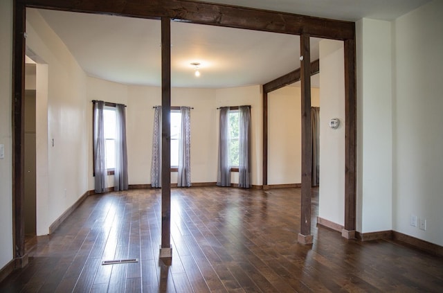 305 2nd Ave SE, Plainview, MN 55964 - unfurnished room featuring healthy amount of natural light and dark wood-style flooring