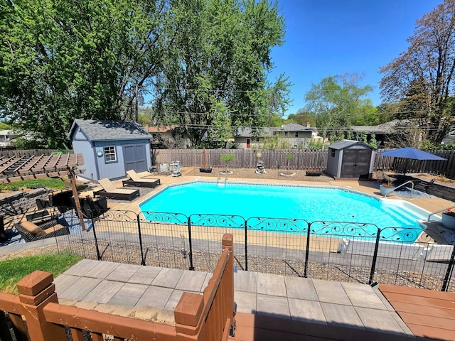 8047 Ingleside Ave S, Cottage Grove, MN 55016 - view of pool with a storage unit, a fenced backyard, and a patio area