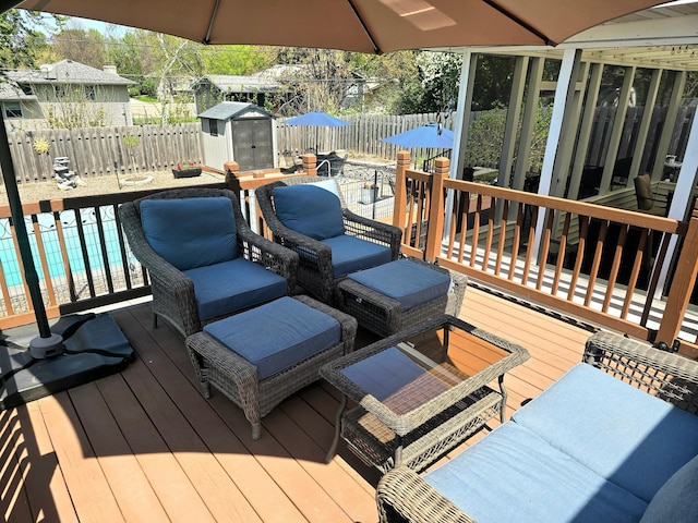8047 Ingleside Ave S, Cottage Grove, MN 55016 - deck with a storage unit and a fenced backyard
