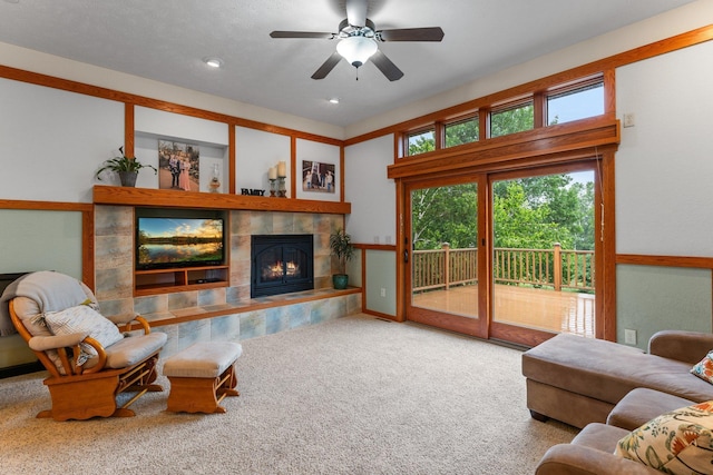 1905 Abby Rd, Cumberland, WI 54829 - living area with a fireplace, healthy amount of natural light, carpet floors, a ceiling fan, and recessed lighting