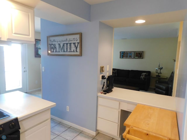 42710 County Highway 56 Unit 101, Toad Lake Twp, MN 56544 - kitchen with light tile patterned floors, white cabinetry, light countertops, and recessed lighting