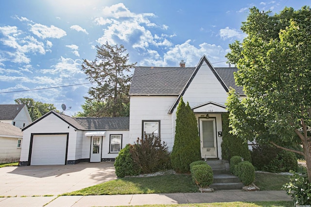 462 Saint Charles St, Winona, MN 55987 - view of front of home featuring a shingled roof, an attached garage, and concrete driveway