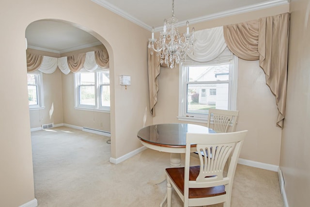 462 Saint Charles St, Winona, MN 55987 - dining space with arched walkways, light colored carpet, a baseboard radiator, crown molding, and a chandelier