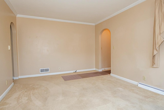 462 Saint Charles St, Winona, MN 55987 - spare room with arched walkways, crown molding, baseboard heating, and carpet