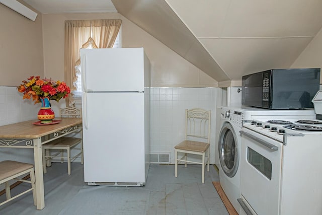 462 Saint Charles St, Winona, MN 55987 - laundry area with tile walls and washer / clothes dryer
