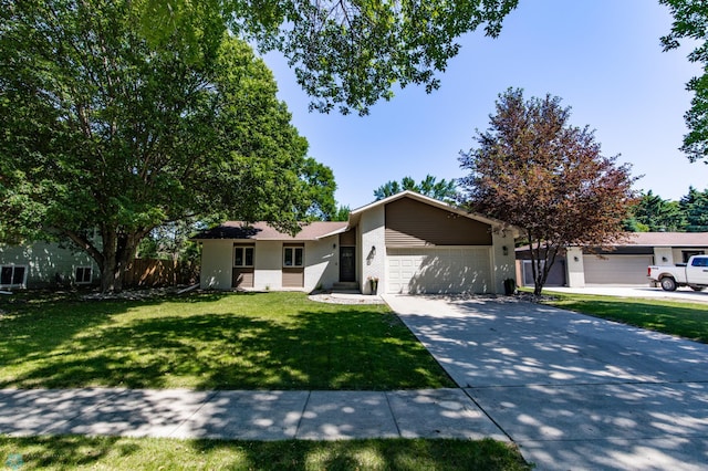25 Birch Ln S, Fargo, ND 58103 - ranch-style house featuring an attached garage and driveway
