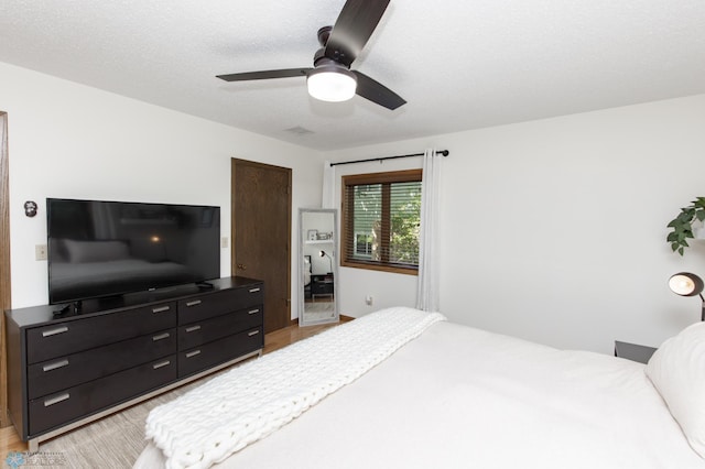 25 Birch Ln S, Fargo, ND 58103 - bedroom featuring light wood-type flooring and ceiling fan