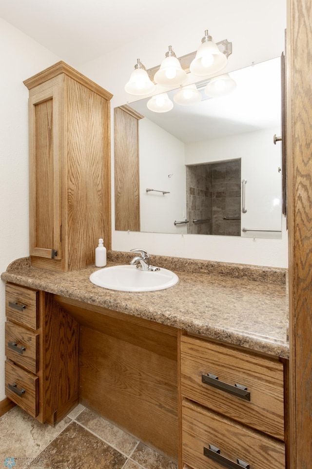 25 Birch Ln S, Fargo, ND 58103 - bathroom featuring vanity and stone finish floors