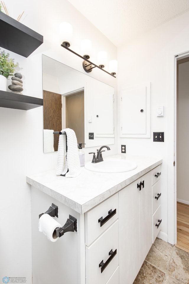 25 Birch Ln S, Fargo, ND 58103 - bathroom featuring vanity and baseboards