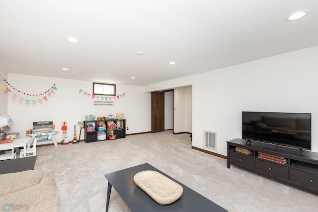 25 Birch Ln S, Fargo, ND 58103 - carpeted living area with recessed lighting and baseboards