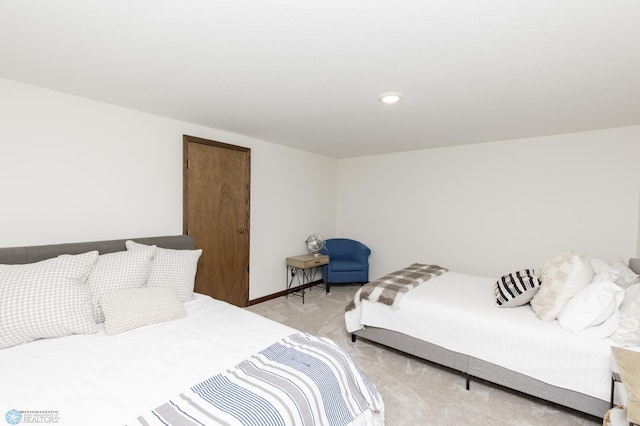 25 Birch Ln S, Fargo, ND 58103 - bedroom featuring light colored carpet and baseboards